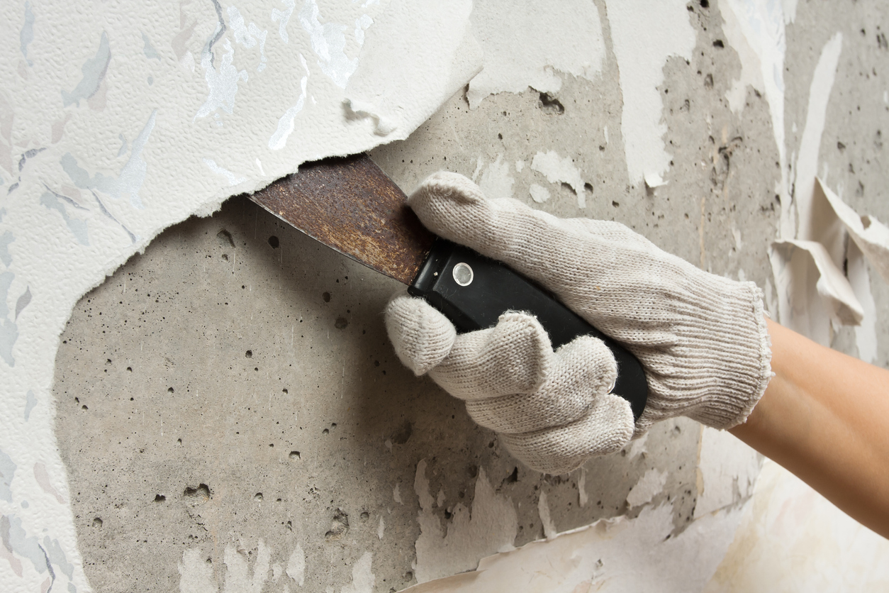 Removing wallpaper from wall from a Sunol, CA area business