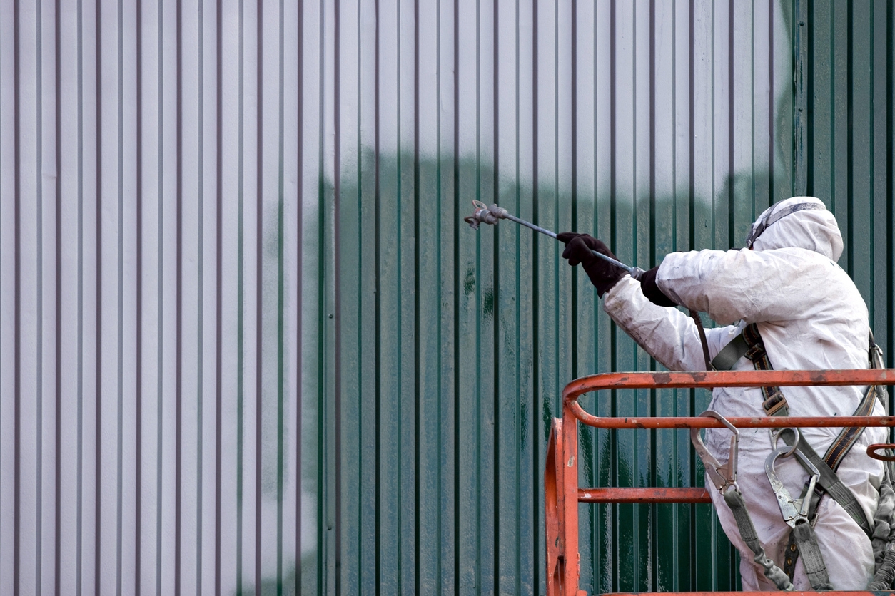 Commercial Painter working on a property in Newark, CA