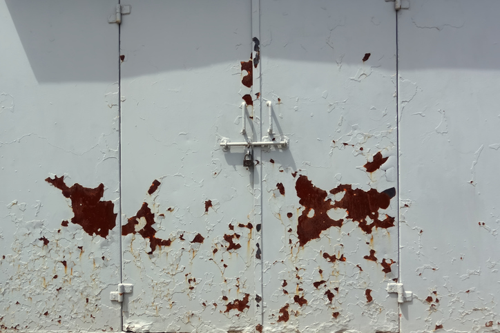 Rusty door with chipping paint