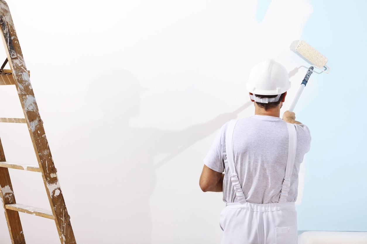 professional painter working on a wall in San Jose
